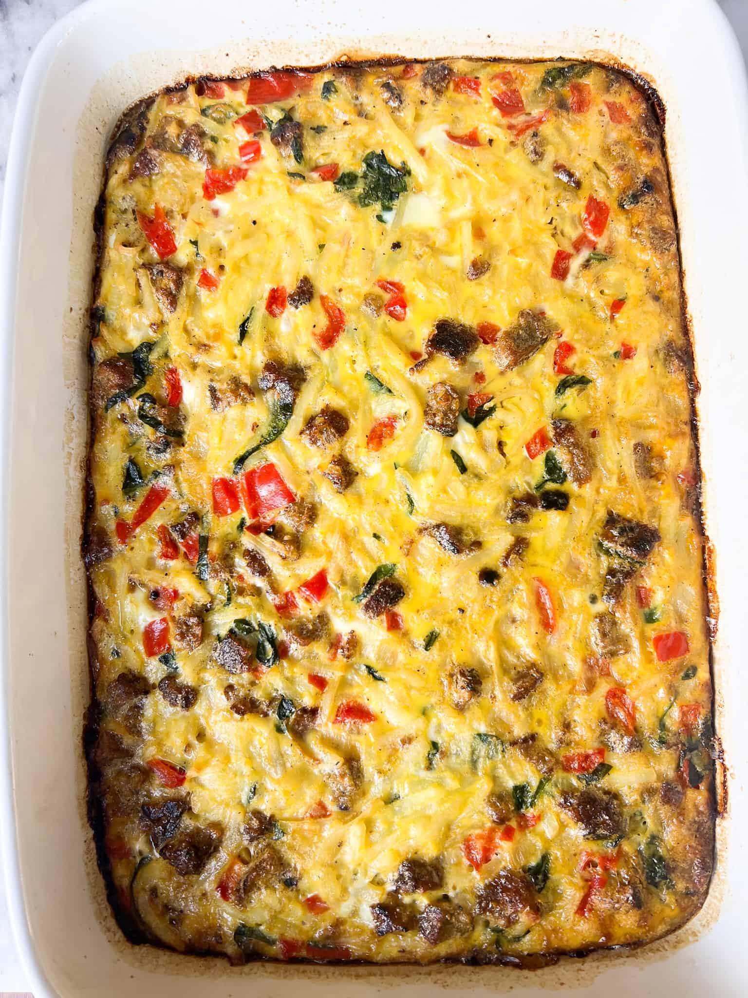 Whole 30 Hashbrown Sausage Breakfast Casserole - The Lovely Dish